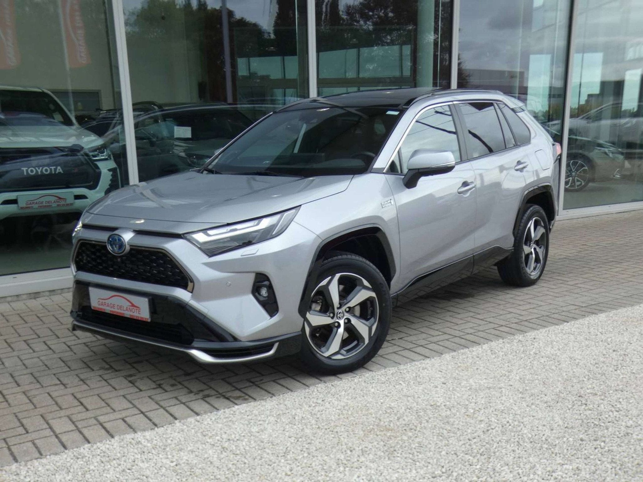 Toyota RAV4 *PLUG-IN* AWD +PANO/OPEN DAK +TREKHAAK +LEDER +J, Auto's, Automaat, Gebruikt, 4 cilinders, 2487 cc