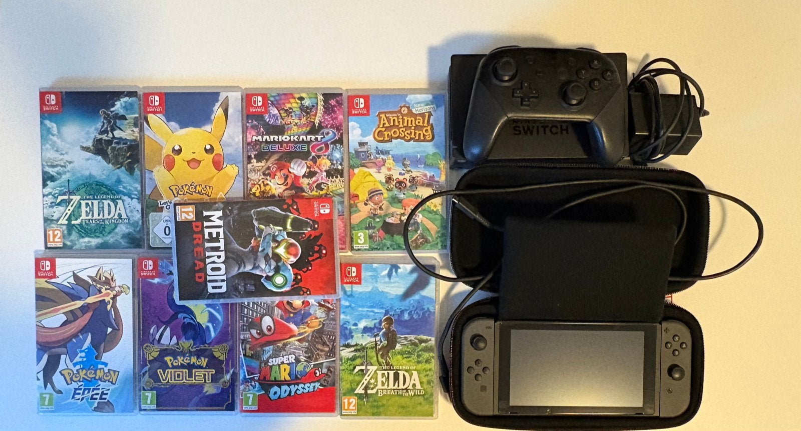 Nintendo Switch + 9 spelletjes en accesoires, Ophalen, Zo goed als nieuw, Met 1 controller, Met games