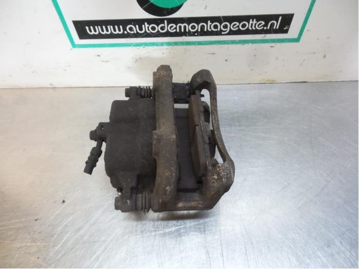 Etrier de frein (pince) avant gauche d'un Nissan X-Trail (X-, -, 3 mois de garantie, Utilisé, -