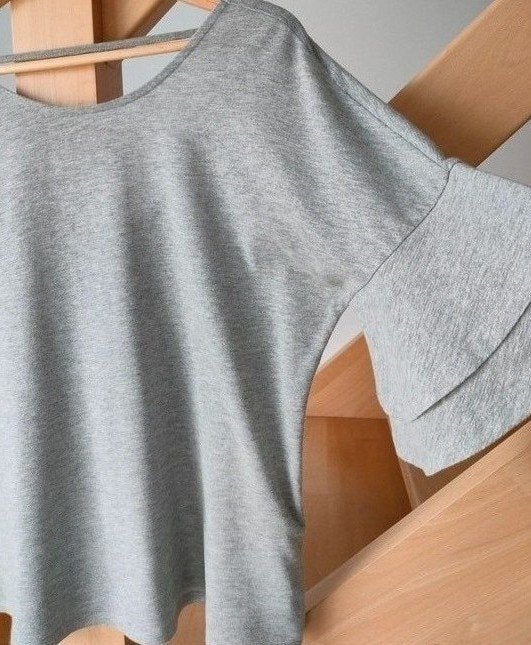 Prachtige glitter T-shirt met open rug. Zeer speciale mouwen, Kleding | Dames, T-shirts, Maat 38/40 (M), Only, Ophalen of Verzenden