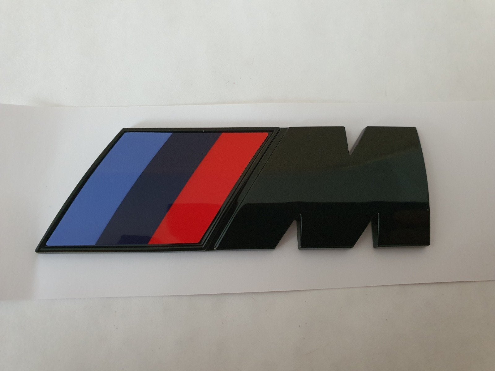 Bmw koffer M power logo in het blinkend zwart 90 mm x 30 mm, Ophalen of Verzenden