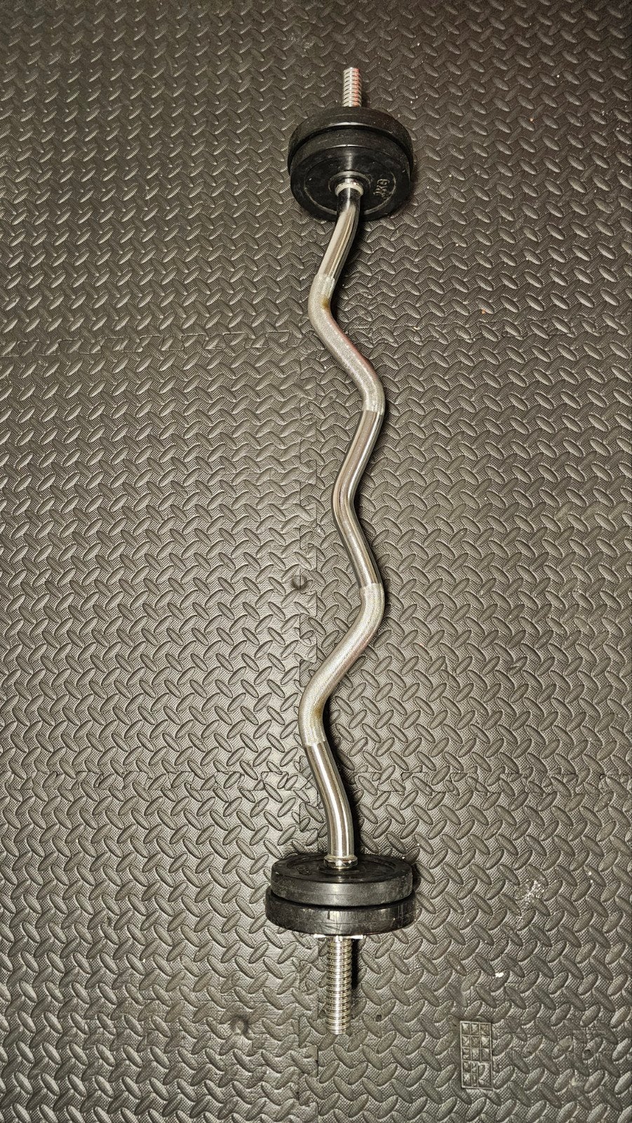 Curlstang met gewichten, Ophalen