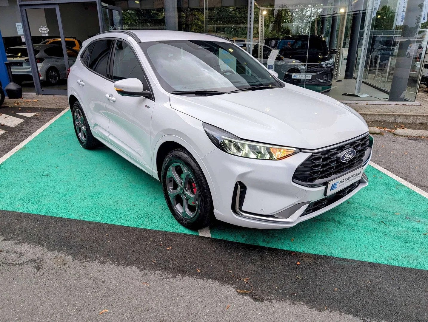 Ford Kuga ST-Line X 2.5i 243pk/178kw Plug-inn Hybrid HF55 Au, Auto's, Automaat, Gebruikt, 4 cilinders, Wit