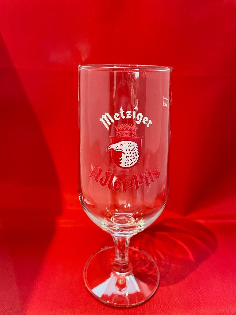 bierglas Metziger Adler-pils 25cl Haacht, Ophalen of Verzenden, Gebruikt, Bierglas