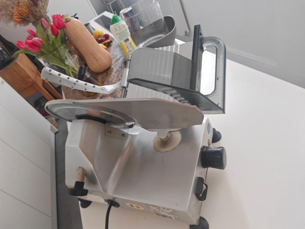Snijmachine brood/vlees, Ophalen