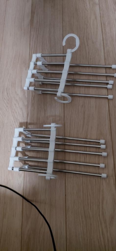 Houders voor broeken, Enlèvement