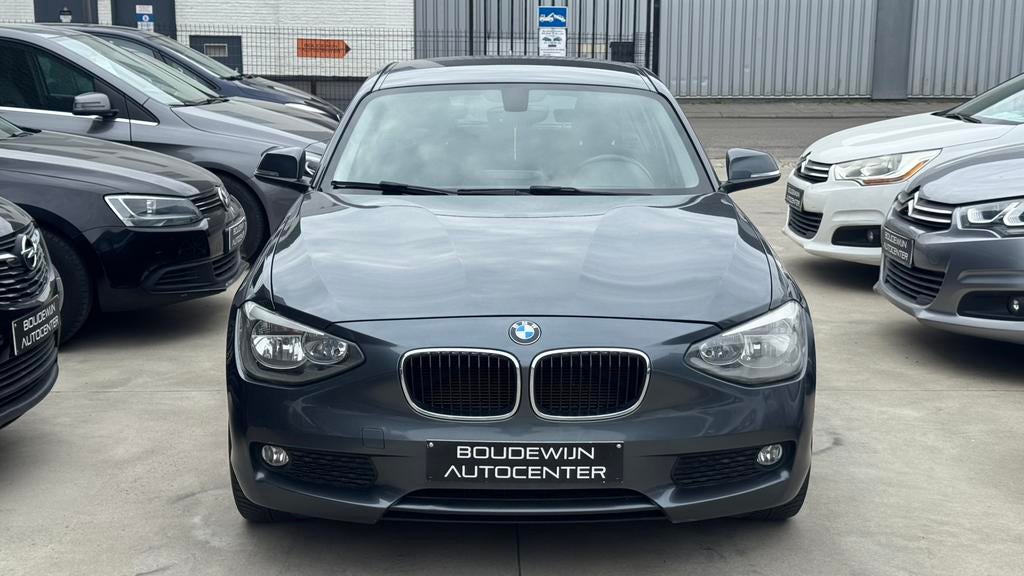 Bmw 1 Serie 1.6Benzine AUTOMAAT 2011 170.xxxkm Topstaat, Auto's, BMW, Automaat, Zwart, 5 deurs, https://public.car-pass.be/vhr/61240180-234f-4c4d-94f5-52f9d5f55593