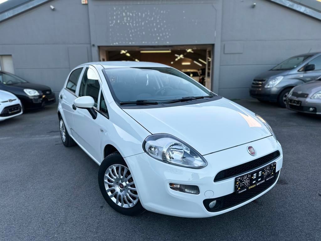 Fiat Punto 1.2i | Airco | Weinig km | Euro6b | GARANTIE |, Auto's, Fiat, Stof, Wit, Parkeersensor, 5 deurs