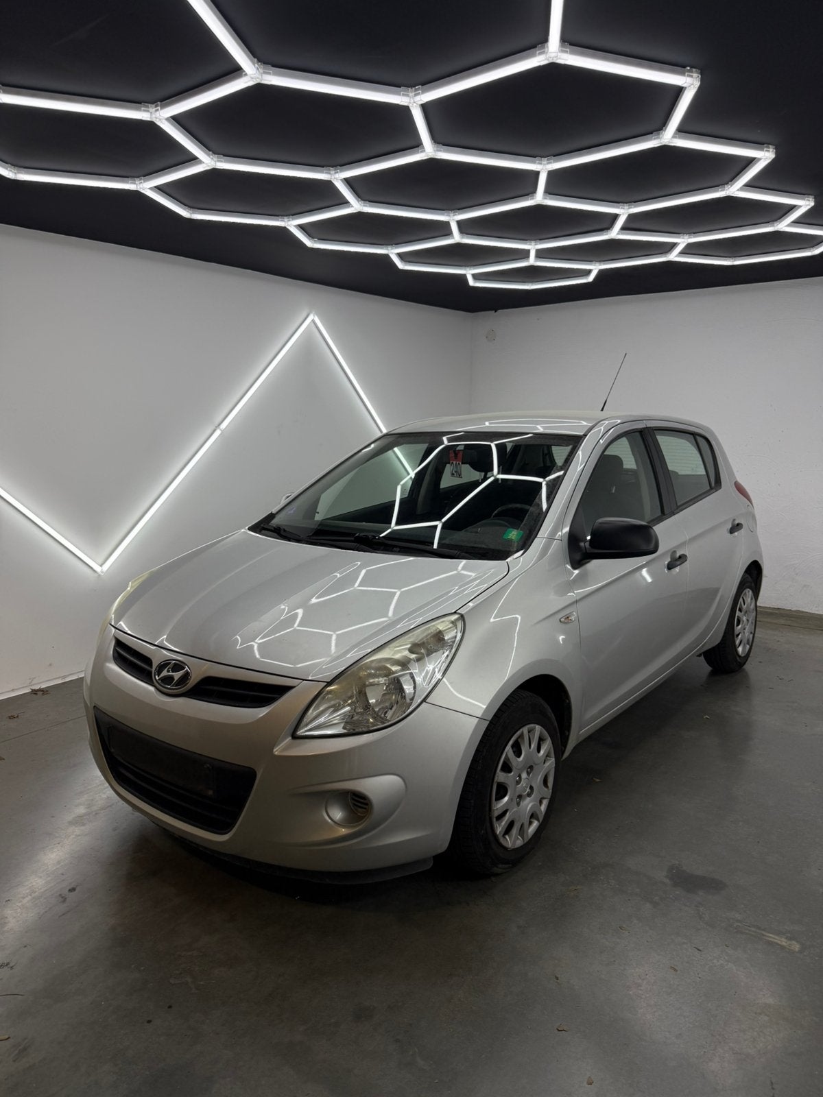 Hyundai i20| 2012| SLECHTS 92.580KM| 1 JAAR GARANTIE, Auto's, Euro 5, Stof, Zwart, 4 cilinders