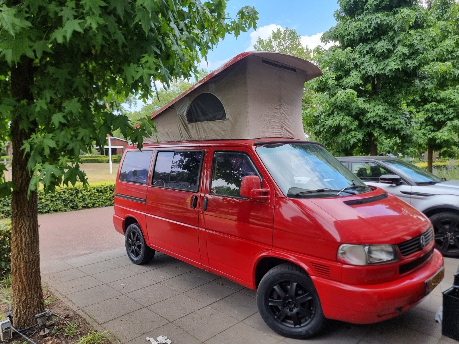 vw t4  L.P.G camper met hefdak op L.p.g. inruil mogelijk., Enlèvement, Utilisé, Jusqu'à 4
