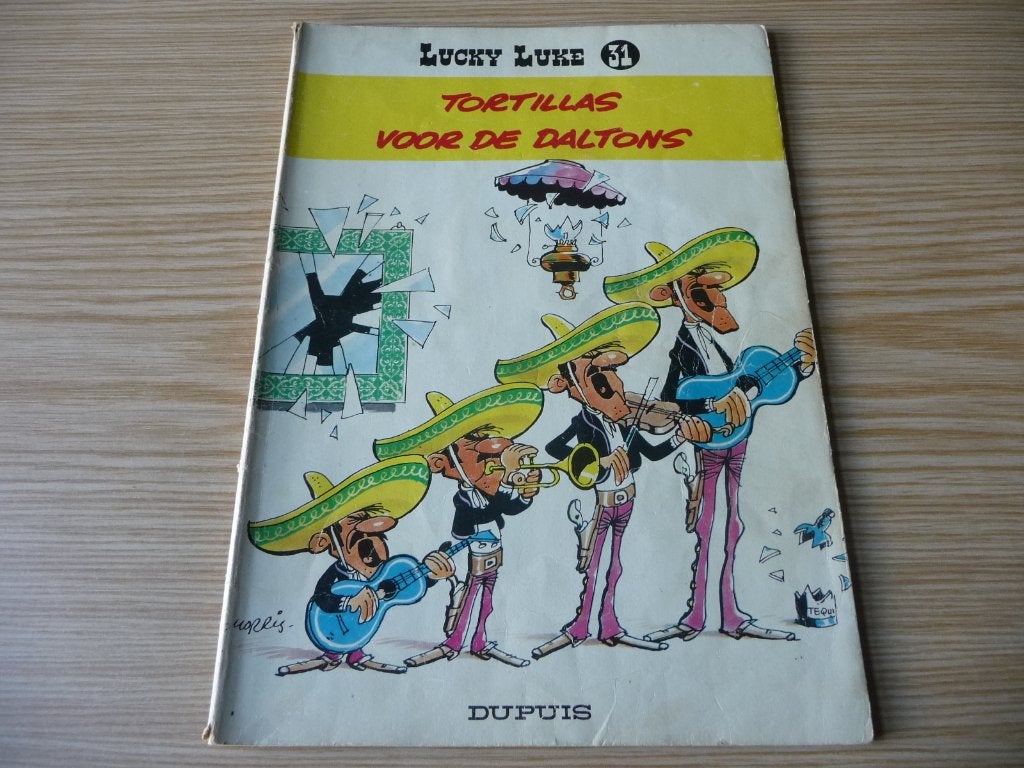 Lucky Luke 31. Tortillas voor de Daltons 1977 €1, Gelezen, Eén stripboek, Ophalen of Verzenden, Morris & Goscinny,
