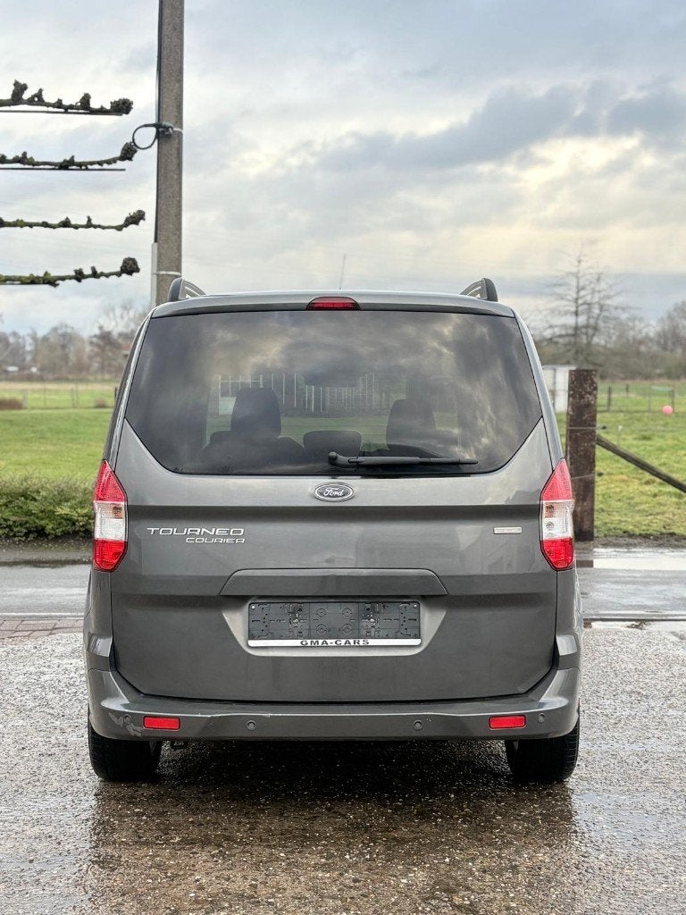Ford Tourneo Courier 1.0i EcoBoost Titanium Airco Cruise, Auto's, Euro 6, Bedrijf, Handgeschakeld, Parkeersensor