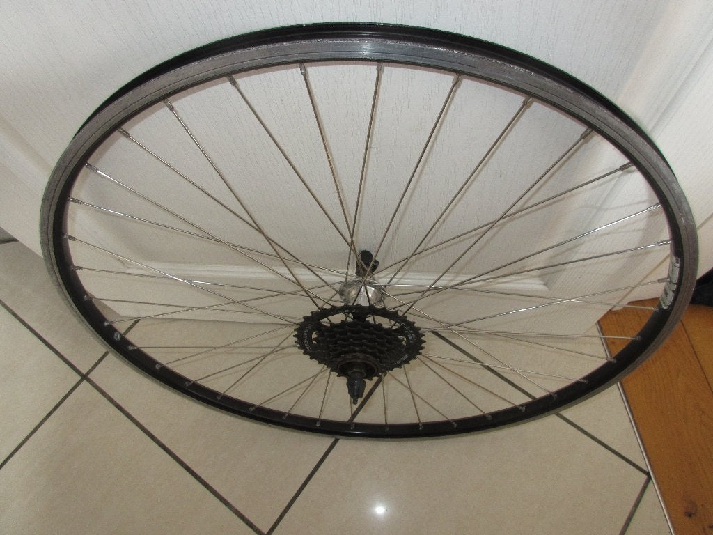 Achterwiel 28 X 1 3/8 met 7 versnellingen en snel sluiting, Fietsen en Brommers, Gebruikt, Mach 1, Stadsfiets, Ophalen