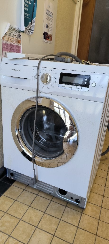 Lave linge Thomson WT1407E, Electroménager, 1200 à 1600 tours, 6 à 8 kg, 85 à 90 cm, Chargeur frontal