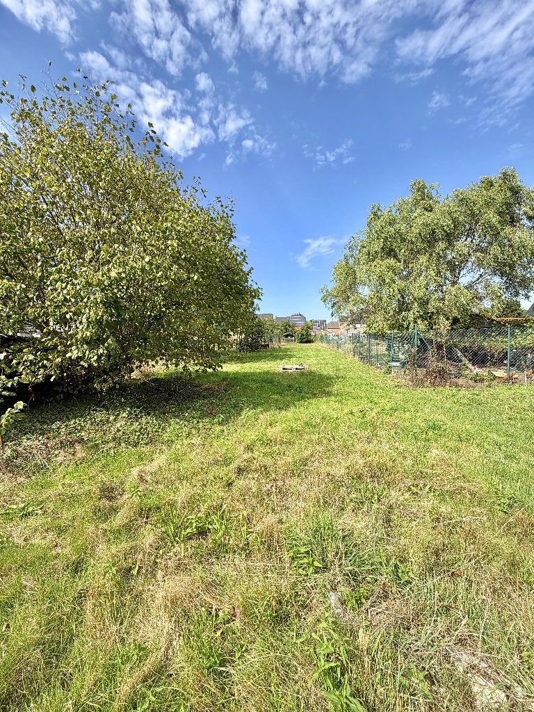 Ruime bouwgrond van 9a 21ca voor halfopen bebouwing, Immo, Koersel-Beringen, 500 à 1000 m²