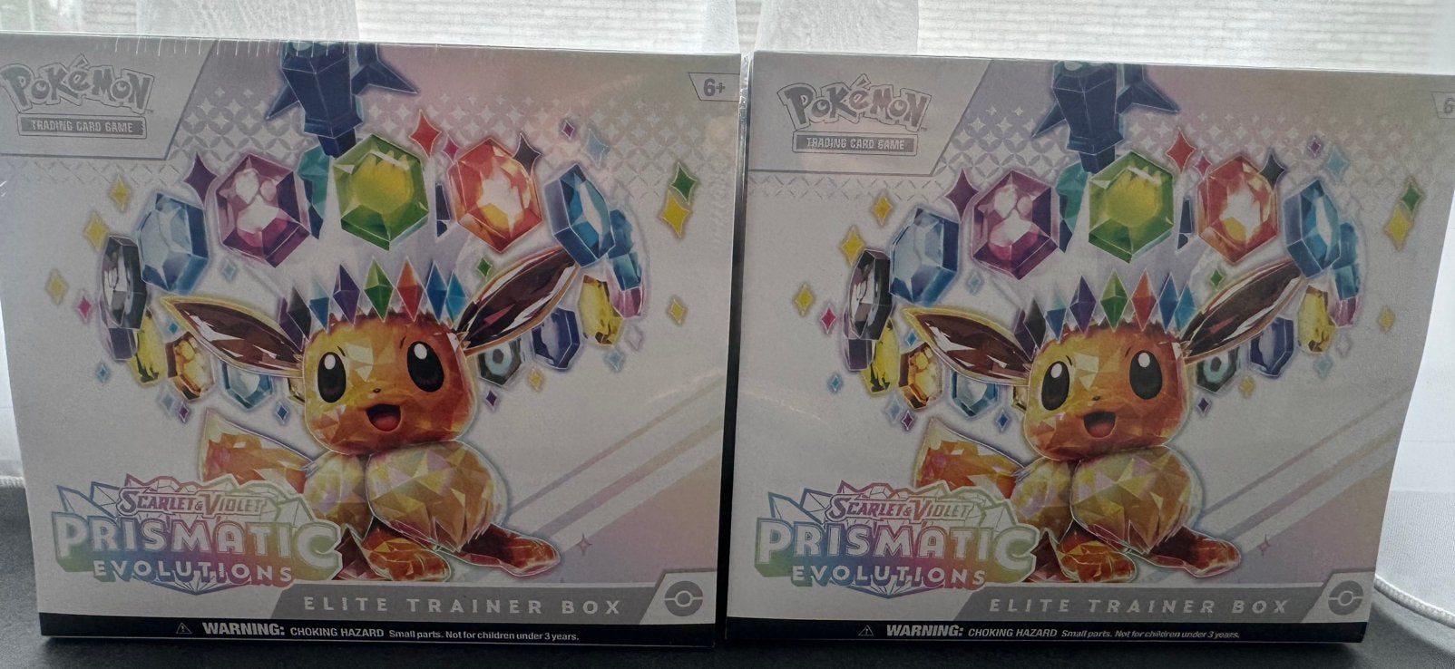 Pokemon prismatic evolutions elite trainer box 2x, Hobby en Vrije tijd, Ophalen, Nieuw