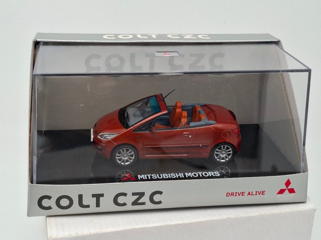 Mitsubishi Auto's Mitsubishi Colt 1/43 "oriental orange", Verzenden, Zo goed als nieuw, Auto, Overige merken