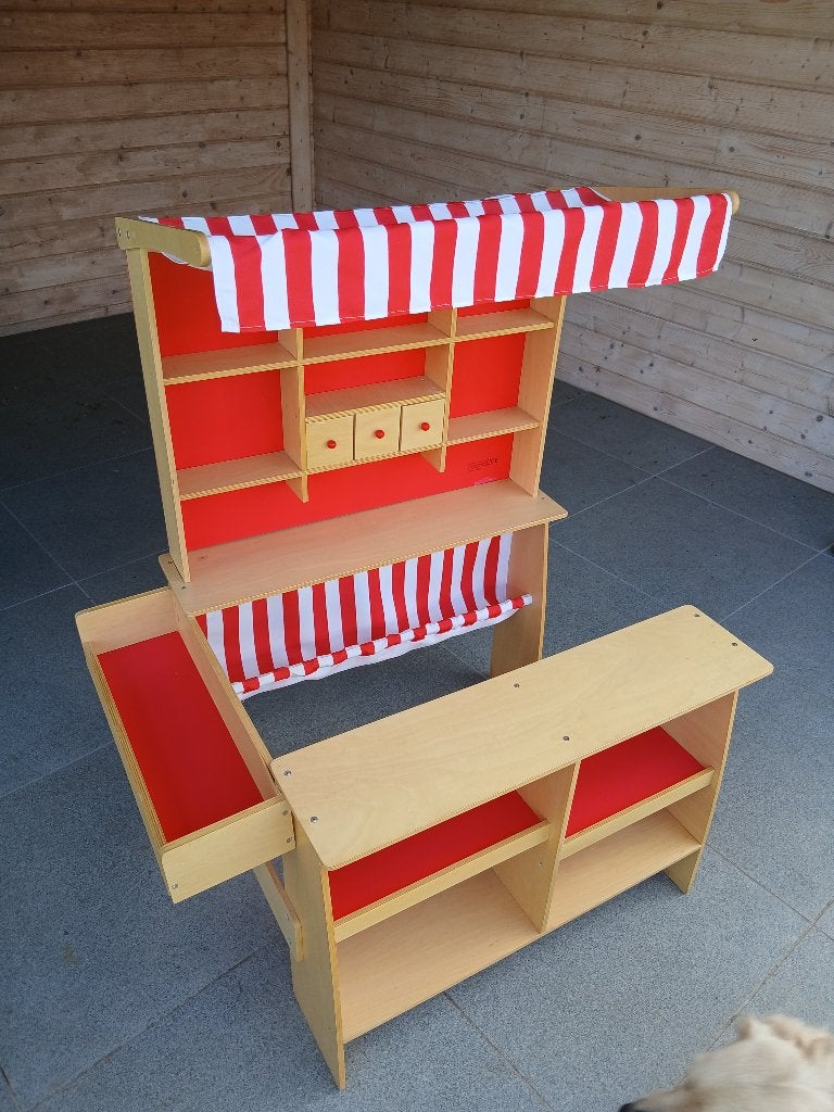 Houten speelgoedwinkeltje, Ophalen