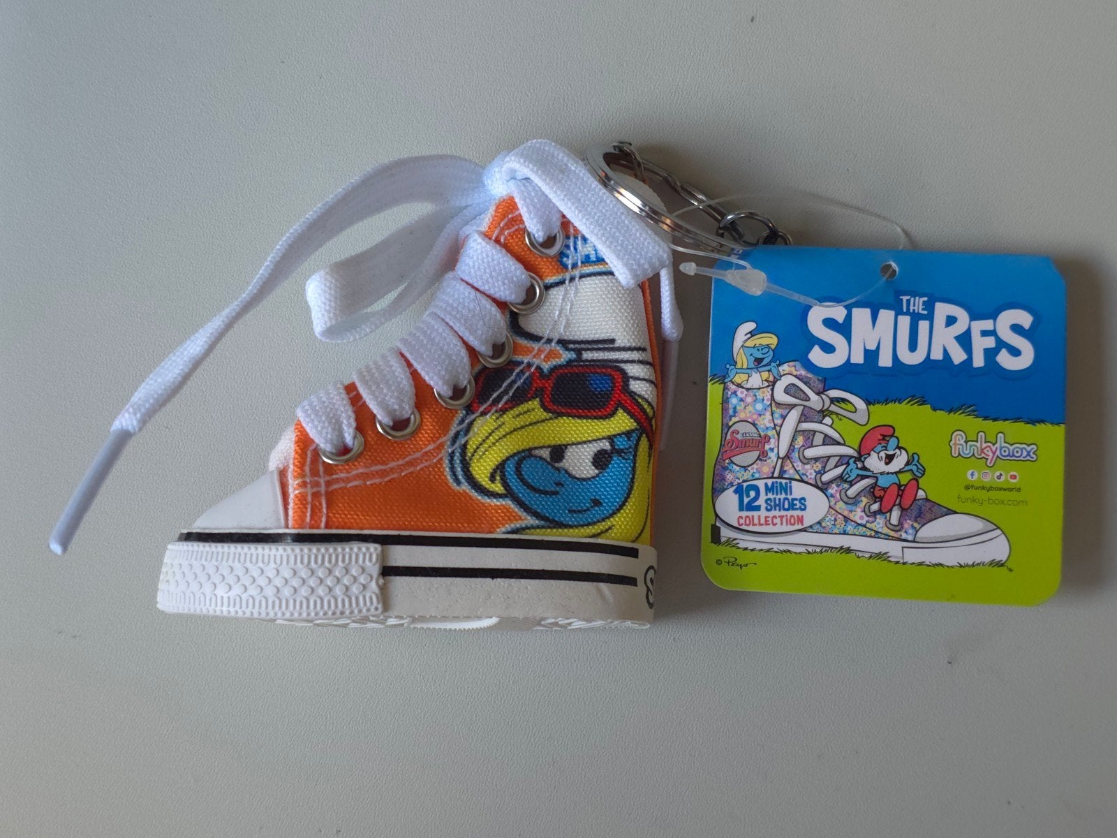 Porte-clé chaussure Schtroumpfette neuf, Verzamelen, Smurfen, Verzenden, Nieuw, Smurfin, Overige typen