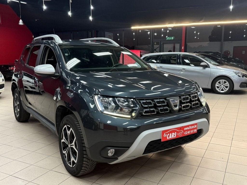 Duster 1.3 TCe 4WD Prestige**NAVIGATIE**CAMERA**4x4**, Auto's, Dacia, Stof, 4 cilinders, Duster, https://public.car-pass.be/vhr/b56d4ae7-387d-4759-b218-155b7709852a