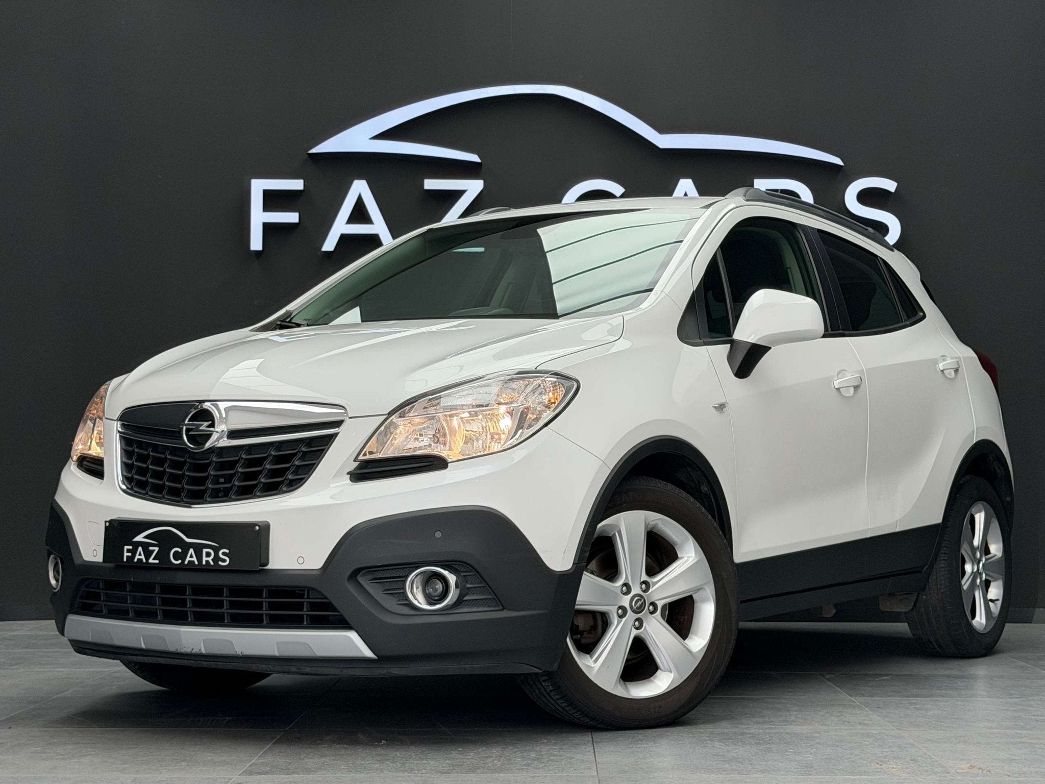 Opel Mokka 1.6i * 1ER PROP + GPS + CLIM + GARANTIE *, Voorwielaandrijving, Stof, Gebruikt, 4 cilinders