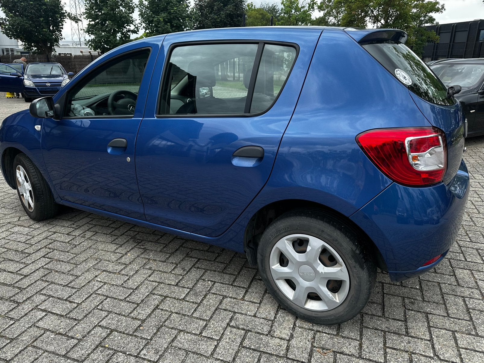 Dacia sandero 2013 essence., Autos, Euro 5, Entreprise, Noir, 5 portes