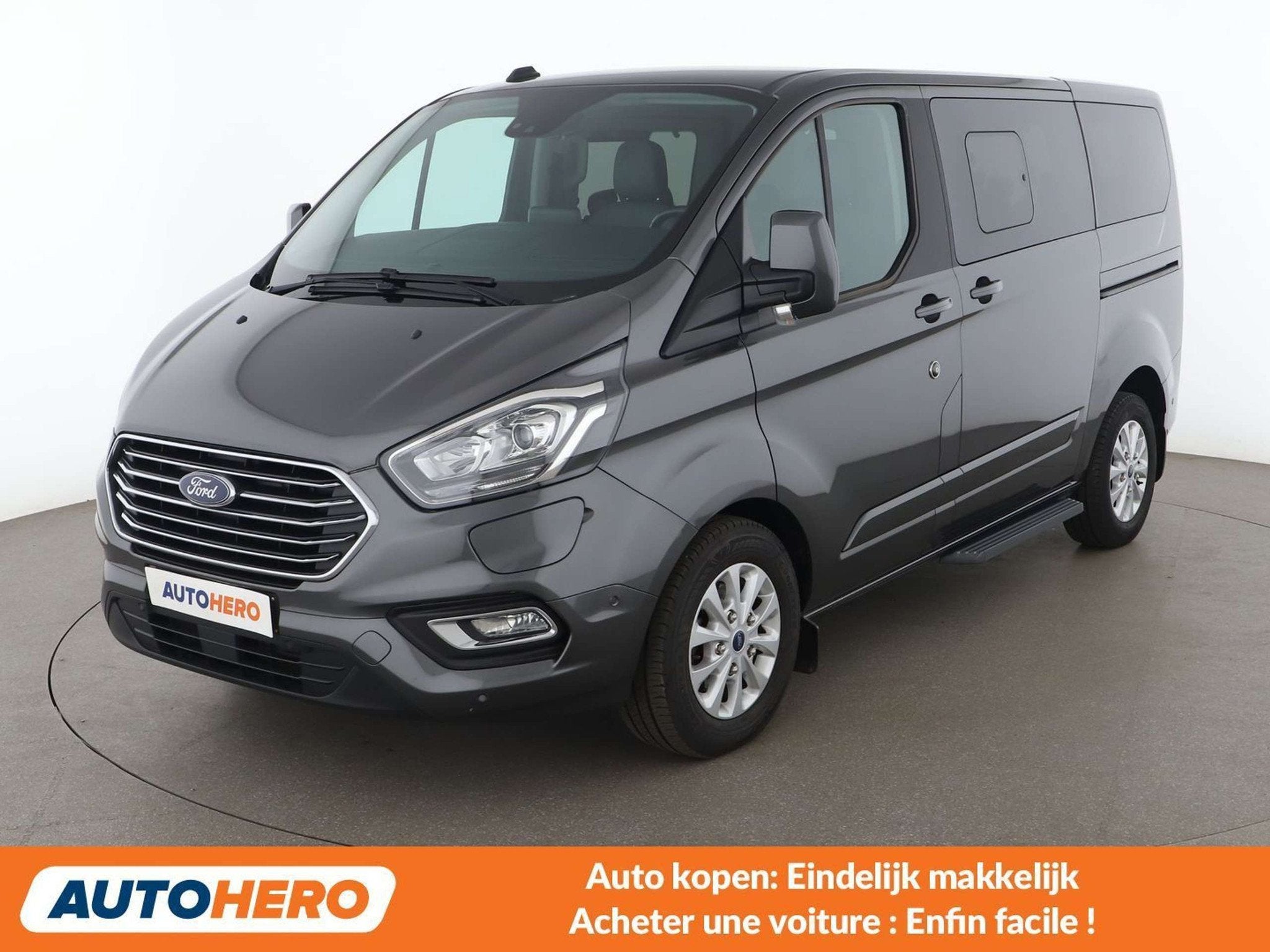 Ford Tourneo Custom 1.0 Plug-in Hybrid 320 L1 Titanium, Auto's, Parkeerassistent, 70 g/km, Gebruikt, Leder