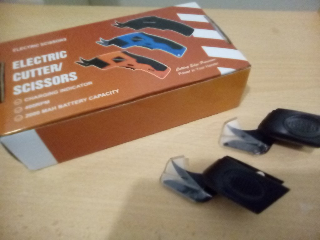 elektrische schaar, Ophalen, Zo goed als nieuw