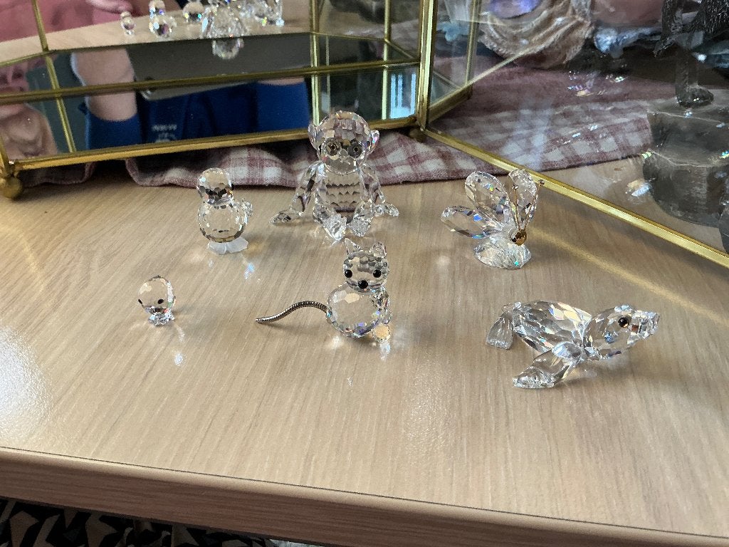 Swarovski beeltjes, Ophalen