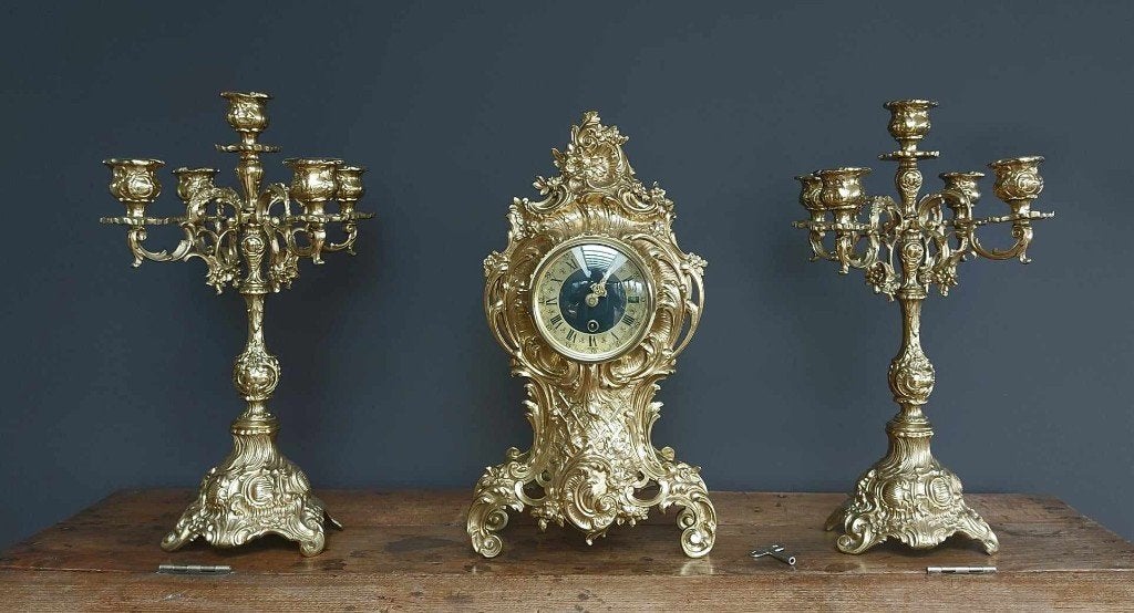 Garniture de cheminée Kienzle en laiton doré, Enlèvement