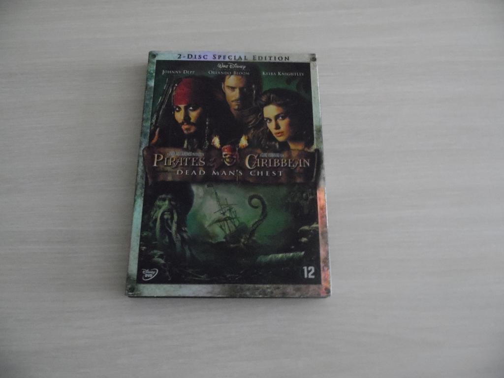 PIRATES DES CARAIBES  LE SECRET DU COFFRE MAUDIT   2 DVD, CD & DVD, DVD | Aventure, Comme neuf, Tous les âges, Enlèvement ou Envoi