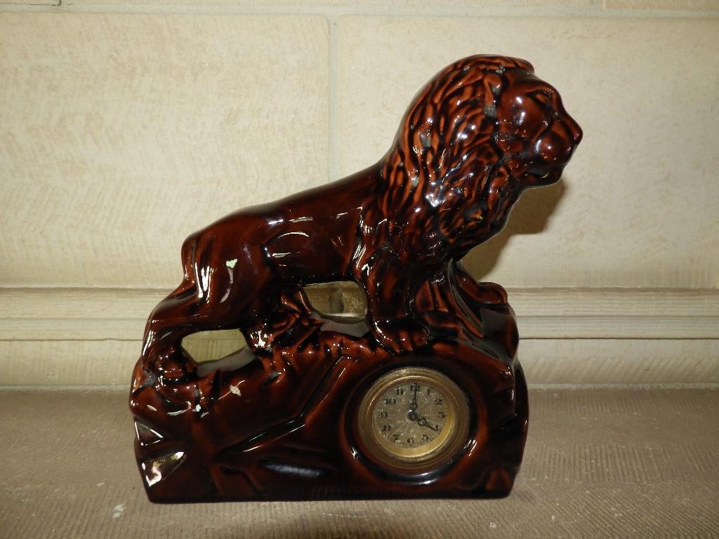 LEEUWENBEELD MET KLOKJE, Ophalen of Verzenden