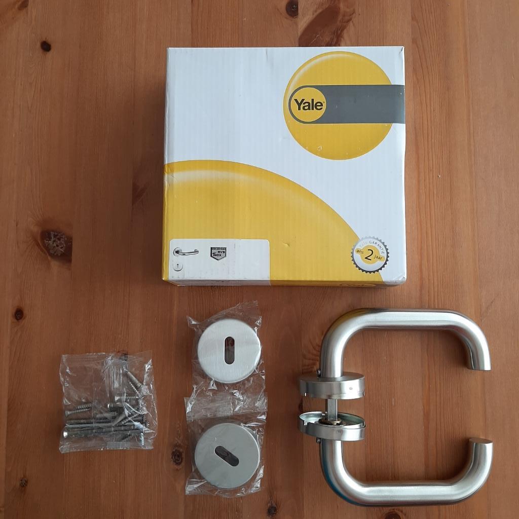 Yale Deurkrukset Dion Inox+Rozetten, Ophalen of Verzenden, Nieuw, Metaal, Binnendeur