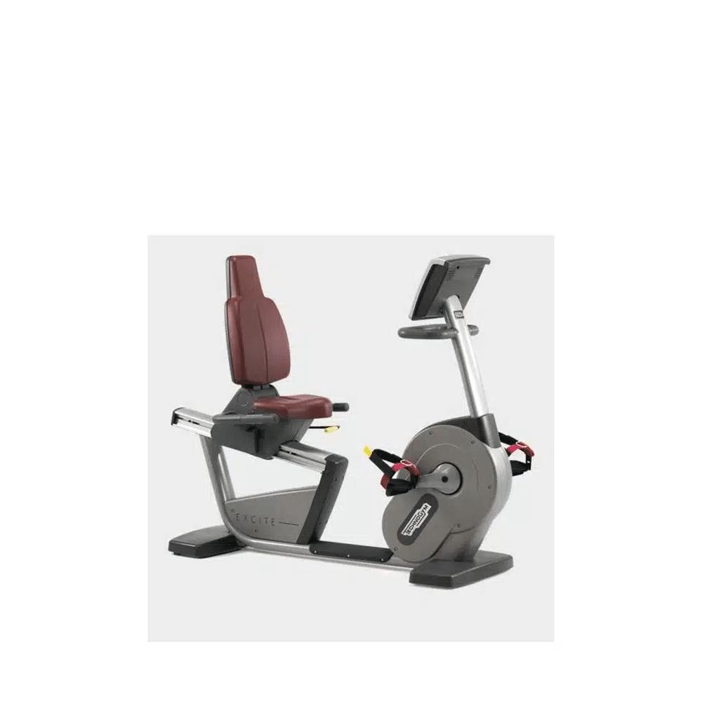 TECHNOGYM – EXCITE RECLINE BIKE 700IP – RECUMBENT BIKE, Enlèvement ou Envoi, Comme neuf, Bras, Autres types