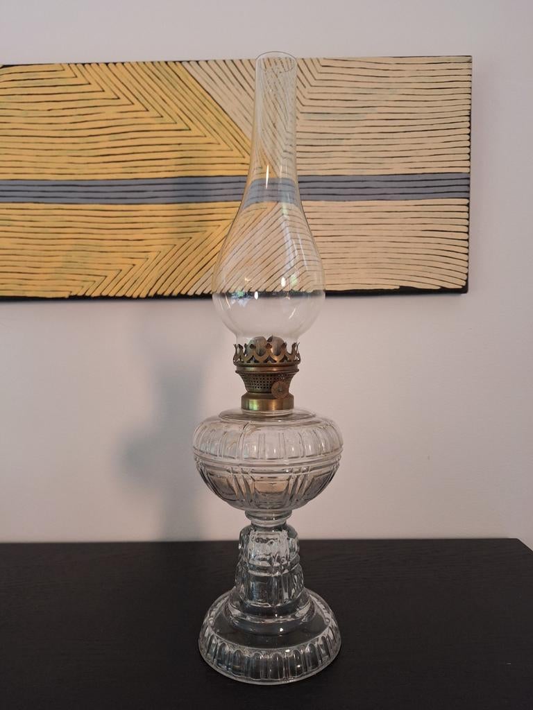 Gegoten glazen petroleumlamp-D.F. Belgica, Ophalen