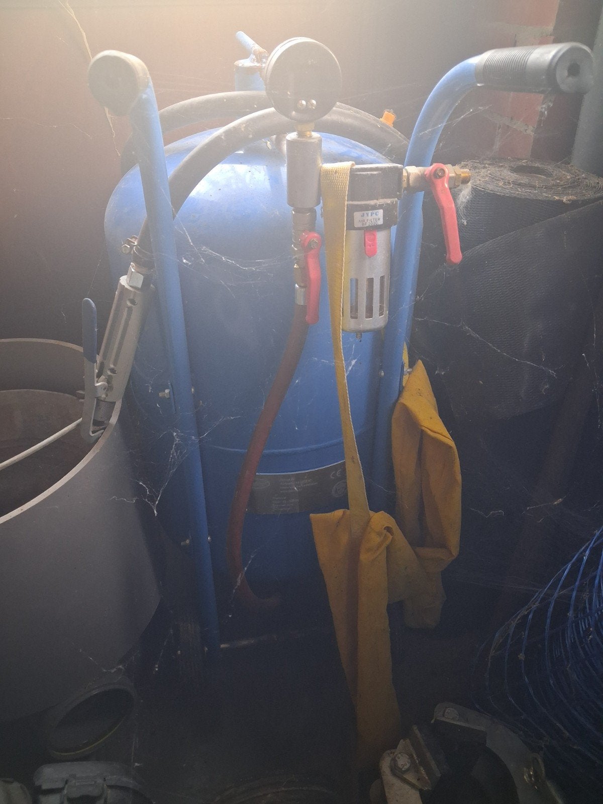 Zandstraal machine, Ophalen