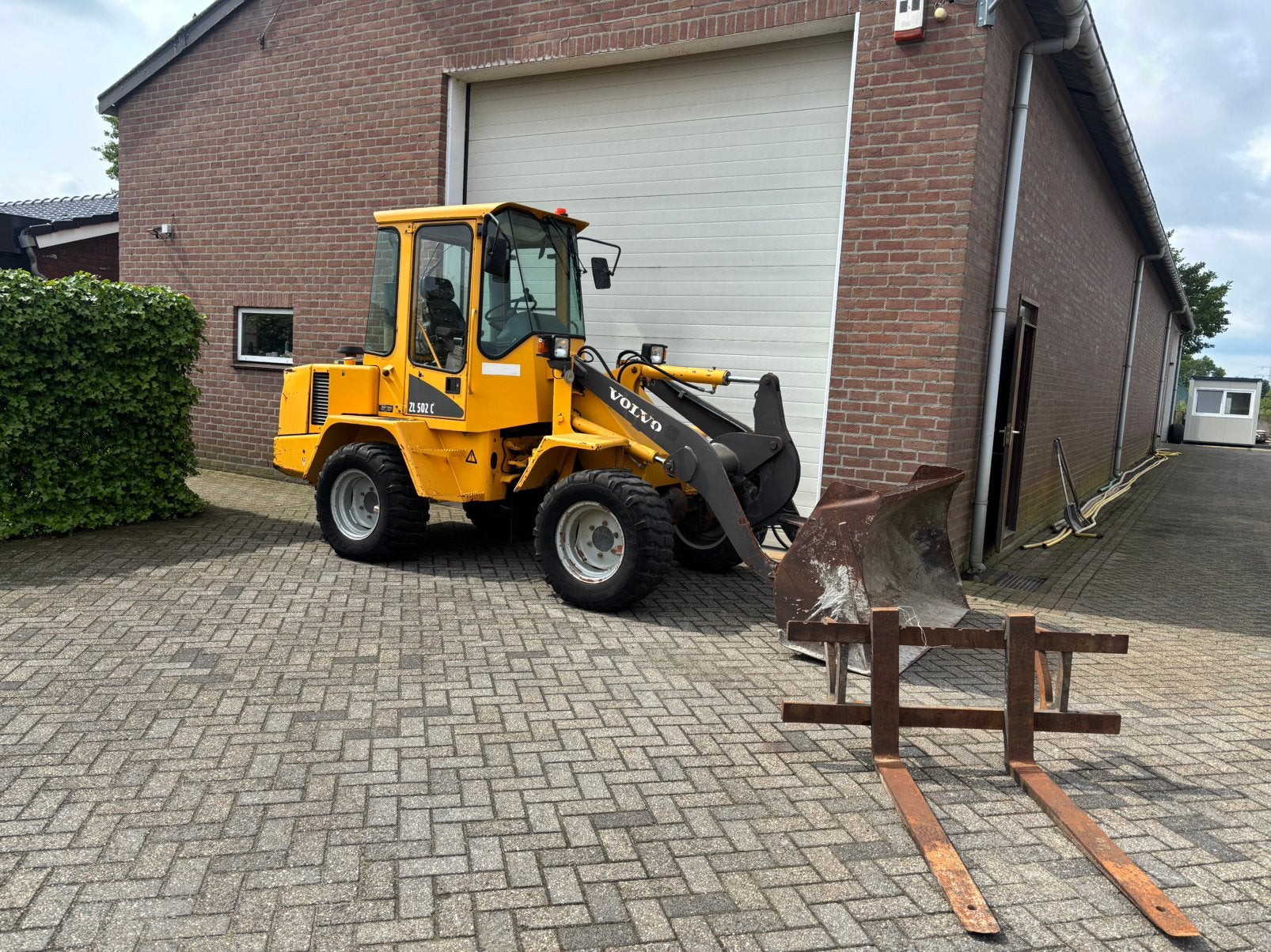 Volvo ZL502C Wiellader shovel kniklader, Ophalen