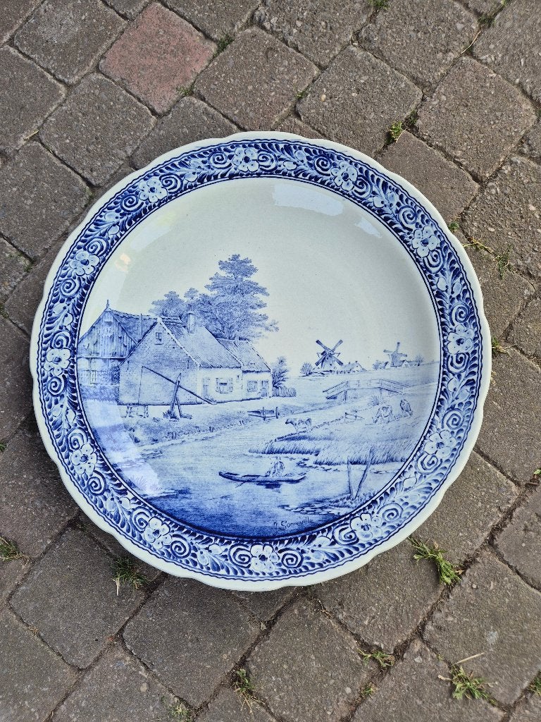 Delfts blauw bord, Ophalen