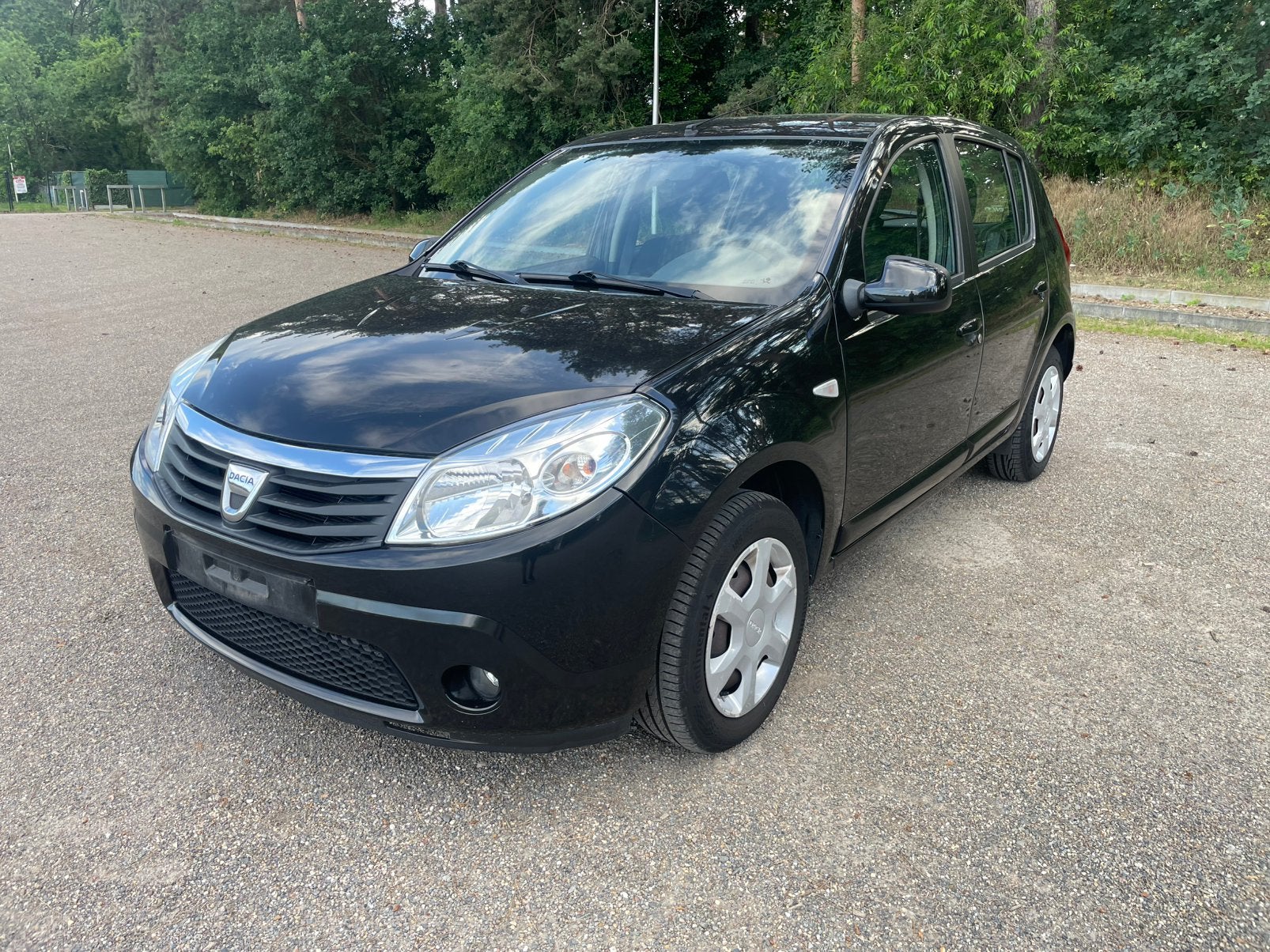 Dacia Sandero 1.2 Benzine| Airco| Trekhaak| Blanco Gekeurd, Autos, Euro 5, 135 g/km, 525 kg, Boîte manuelle