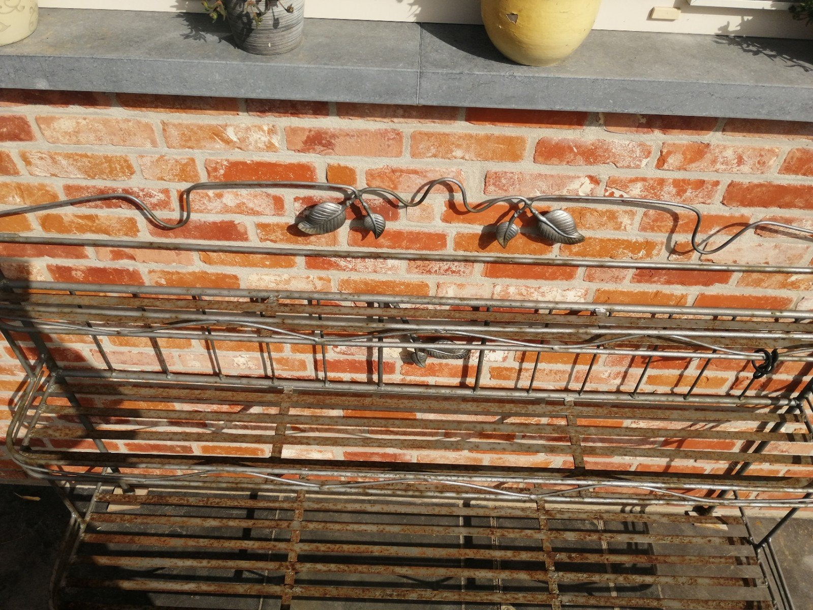 Metalen bloembakkenrek, Ophalen