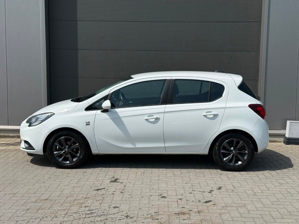 Opel Corsa navigatie cruise controle, Auto's, Voorwielaandrijving, Stof, 4 cilinders, Wit
