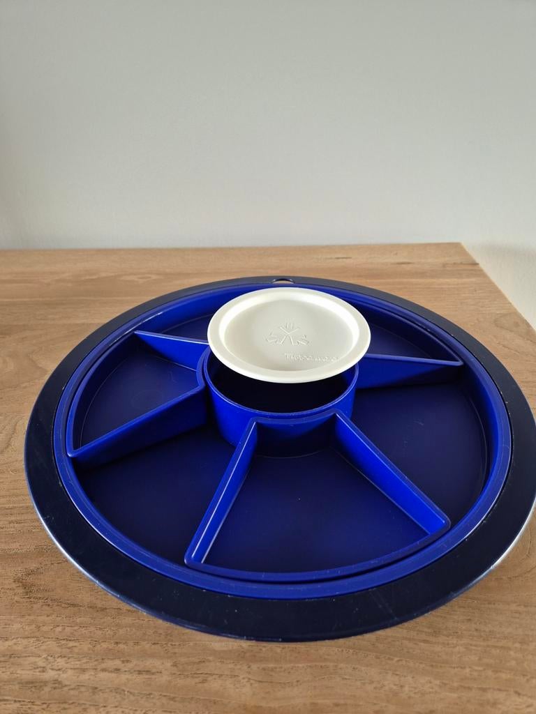 Tupperware hapjesschaal, Ophalen