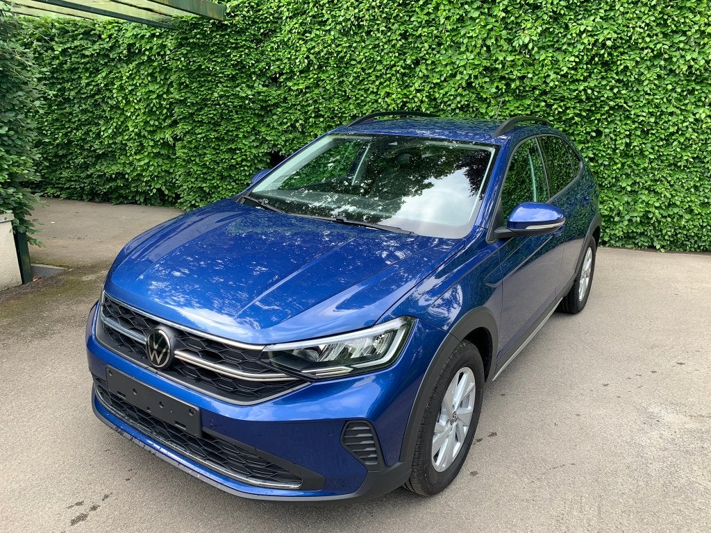 Volkswagen Taigo 1.0 TSI, Auto's, Dealer onderhouden, Euro 6, Blauw, Bedrijf