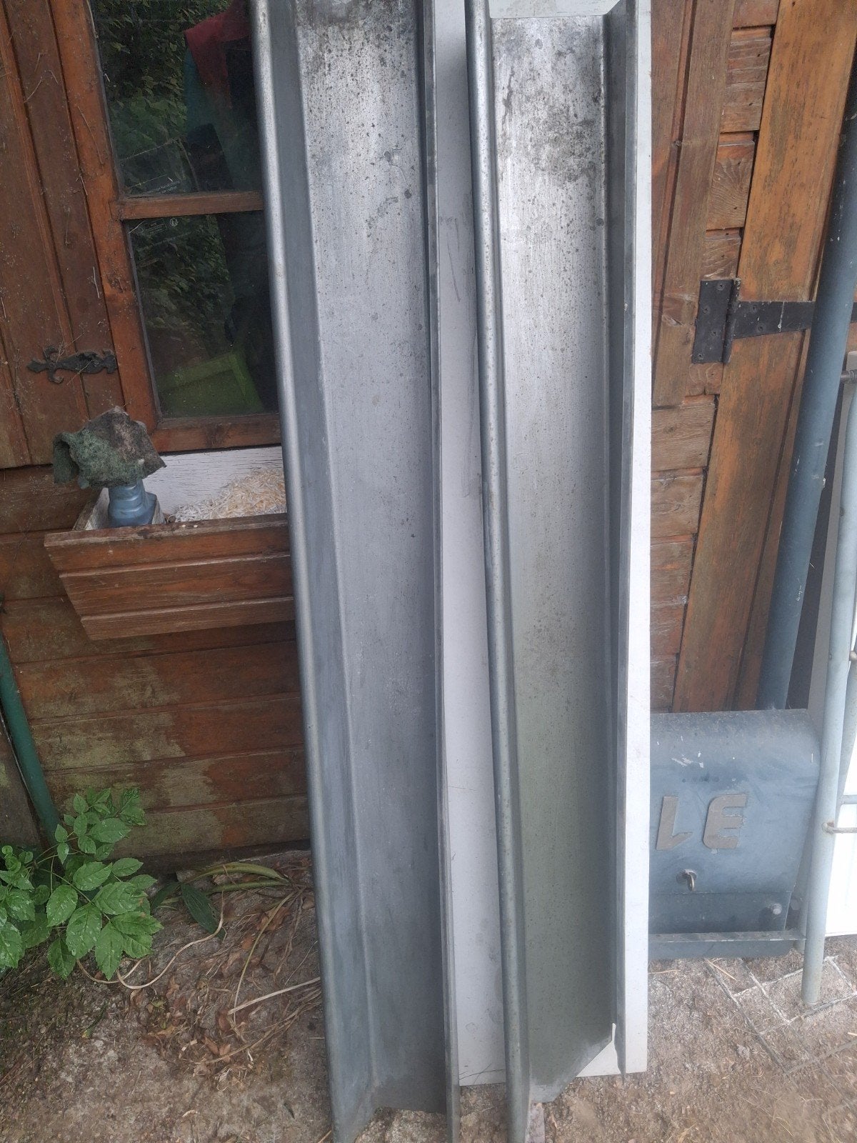 2 lengtes zinkgoot, Ophalen