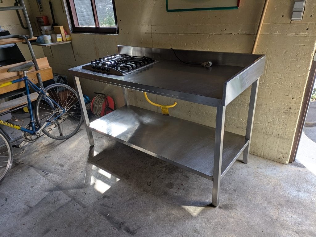 table en acier inoxydable avec feu à gaz - 500€, Articles professionnels, Enlèvement, Utilisé, Mobilier en inox