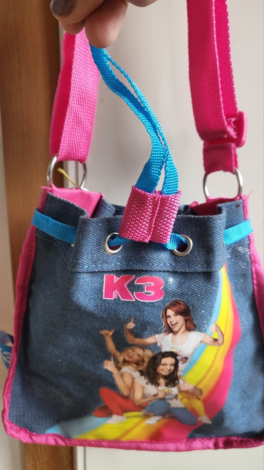 k3 handtas, Ophalen