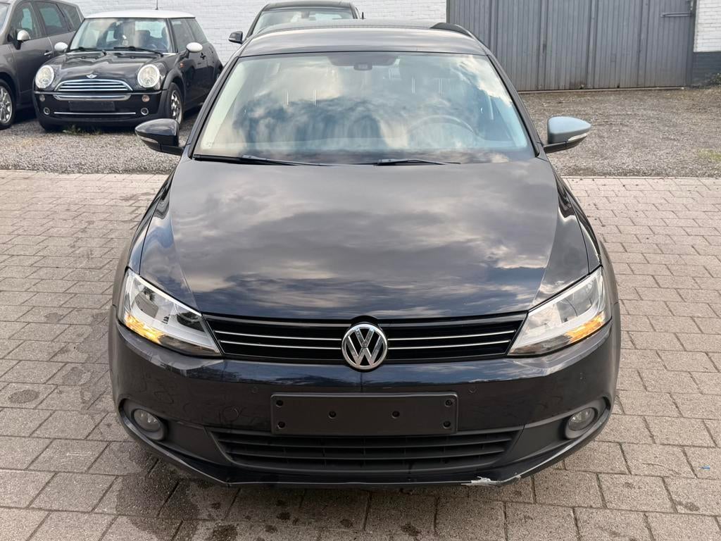 Volkswagen Jetta 1.6TDI 2011 140 000km voir photos, Autos, Euro 5, Ordinateur de bord, Entreprise, Jetta