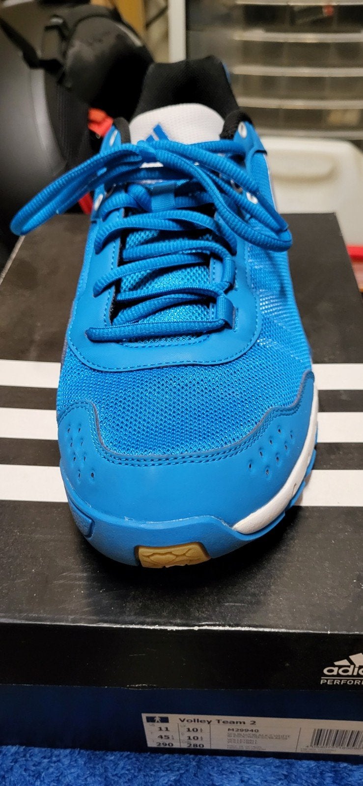 volleybalschoenen Adidas, Ophalen
