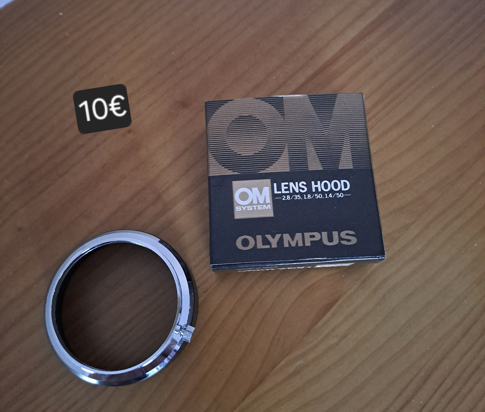 Olympus lens hood, Audio, Tv en Foto, Fotografie | Statieven en Balhoofden, Ophalen of Verzenden