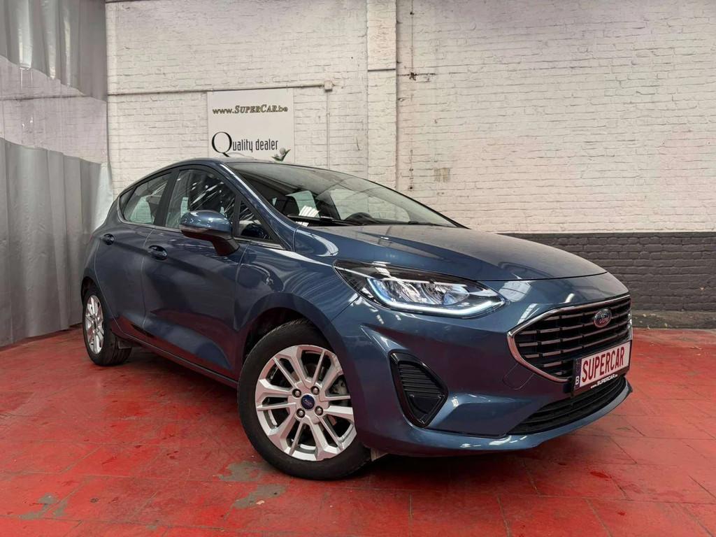 Ford Fiesta Fiesta 1.0 EcoBoost Titanium * CARPLAY * JANTES, Auto's, 121 g/km, Gebruikt, Blauw, https://public.car-pass.be/vhr/b6b6ff66-2335-4468-980b-b2704de10bc2